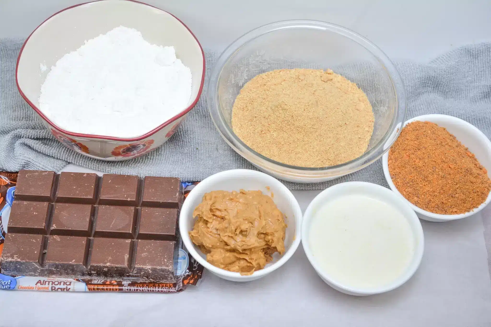 Ingredients for Butterfinger Balls laid out on a counter