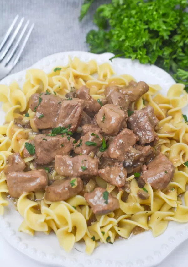 Succulent Slow Cooker Beef Tips in a Flavorful Onion and Mushroom Sauce