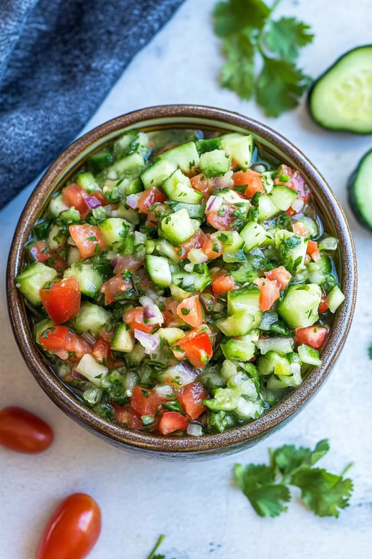 A light and refreshing vegetable medley garnished with a sprinkle of fresh cilantro.