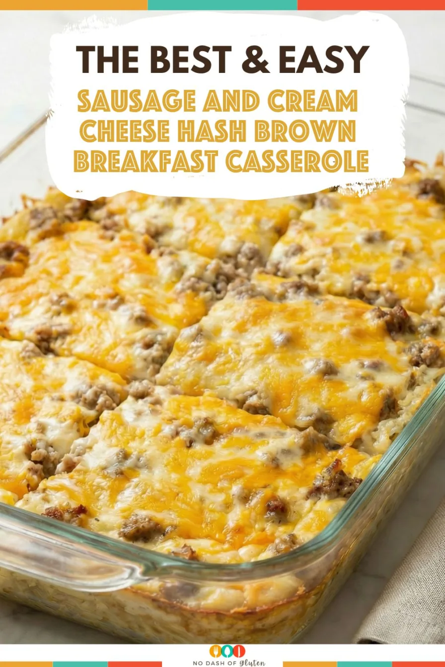 Cheesy baked casserole featured as a Sausage and Cream Cheese Hash Brown Breakfast Casserole in a glass dish