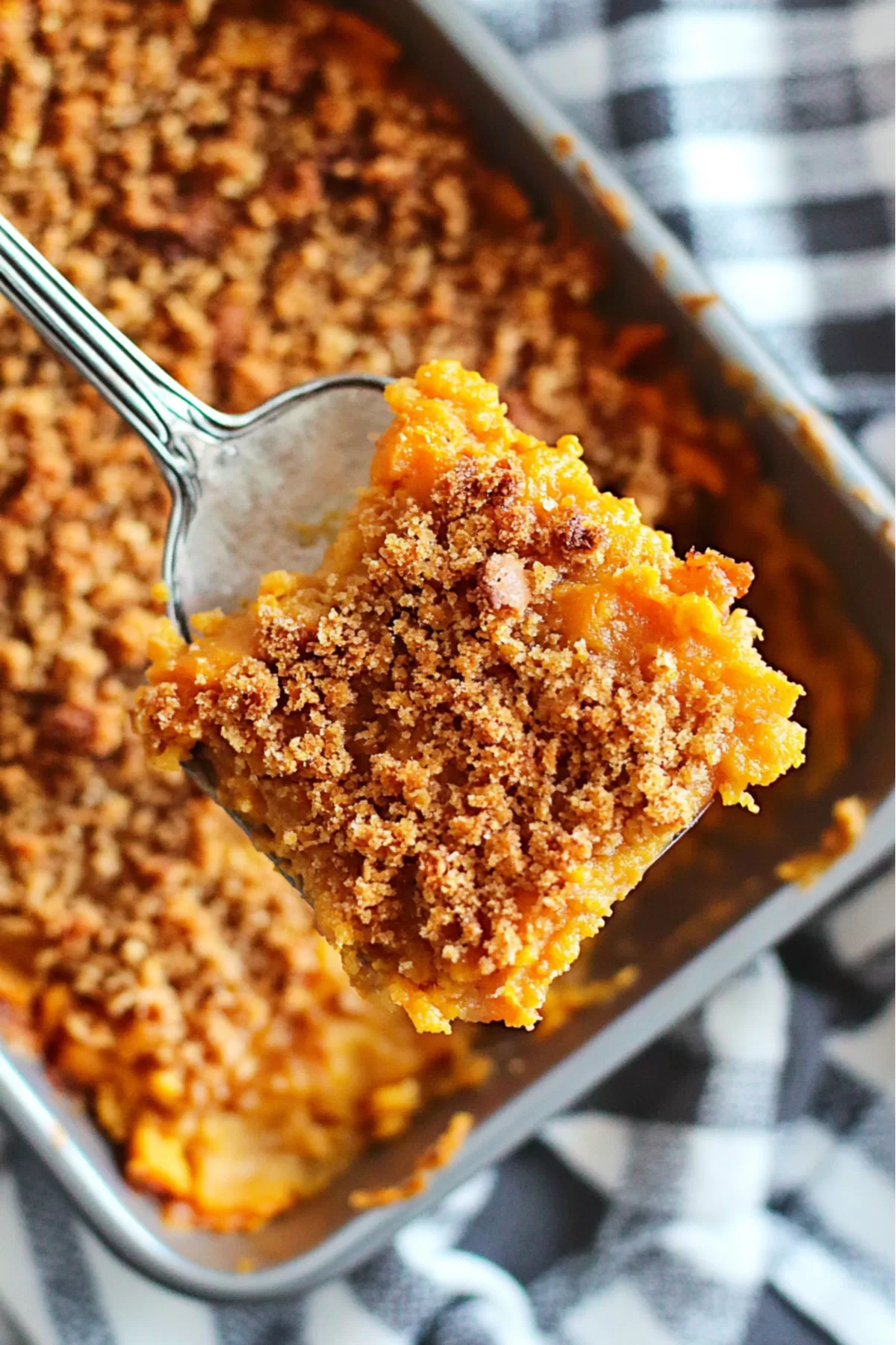 Golden brown casserole with a crispy pecan topping just out of the oven