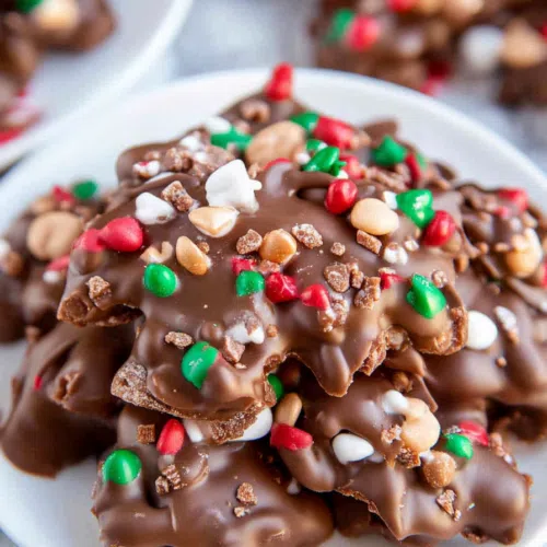 Close-up of sweet and salty Christmas treat pieces, showing their glossy coating.