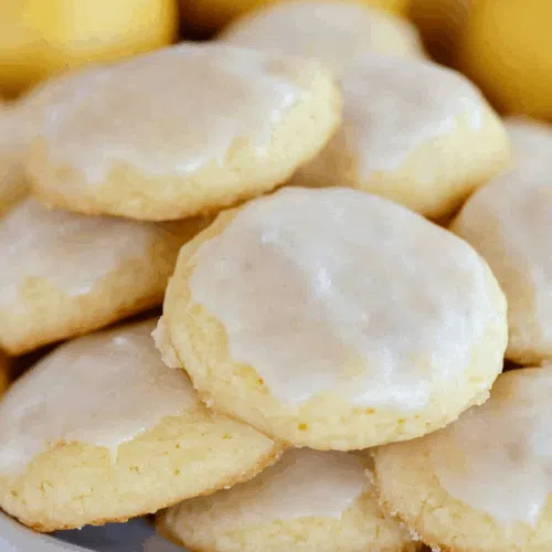 Close-up of a cookie topped with a glossy citrus glaze.