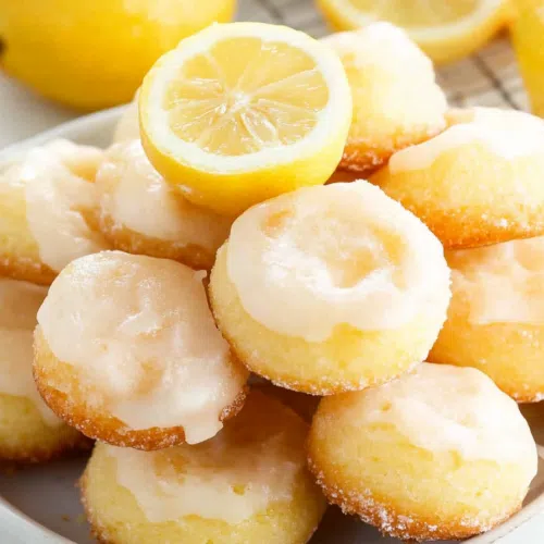 Delicate, golden treats with a shiny, sweet coating, ready to enjoy.