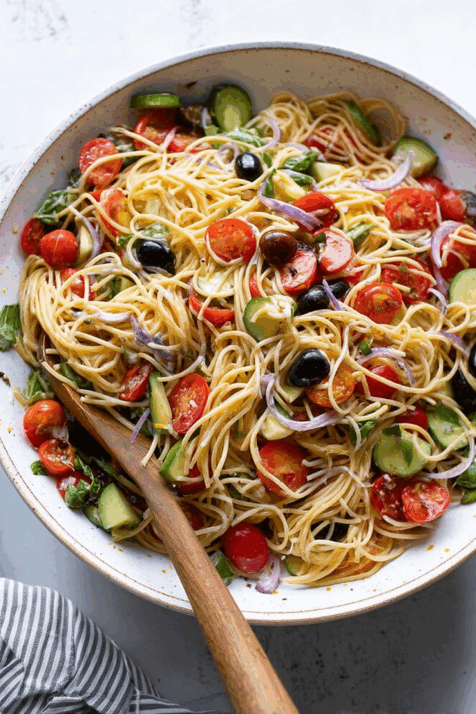 Light and fresh pasta medley styled with herbs and vinaigrette.