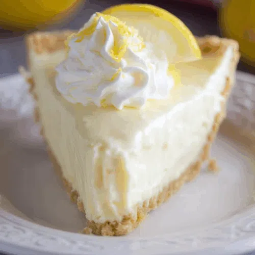 Close-up of a dessert slice with a fluffy texture and smooth surface.