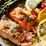 Baked Salmon with Asparagus, Lemon, Garlic and Butter Sauce
