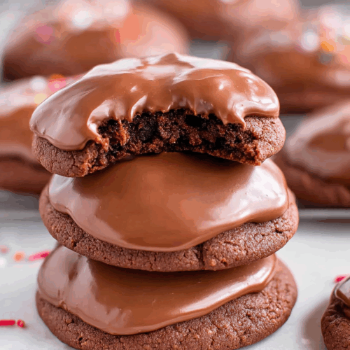 Close-up of rich, frosted cookies on a table.