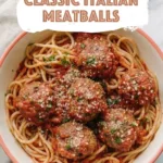 Close-up showing juicy meatball texture with tomato sauce and herbs