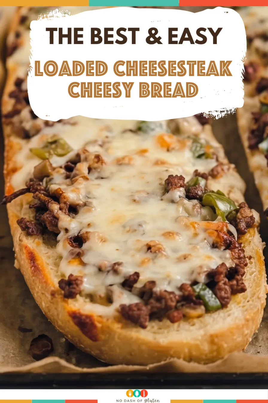 Loaded Cheesesteak Cheesy Bread topped with seasoned beef, peppers, mushrooms, and melted cheese