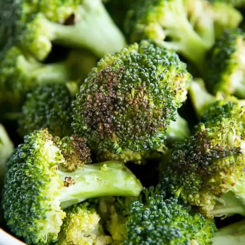 Florets arranged in a bowl, showcasing their vibrant green and crunchy texture.