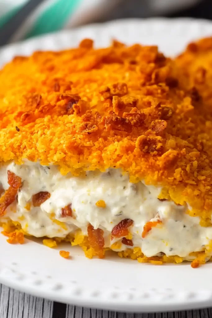 Crispy chicken coated in a crunchy Doritos crust, stuffed with creamy cheese and bacon.