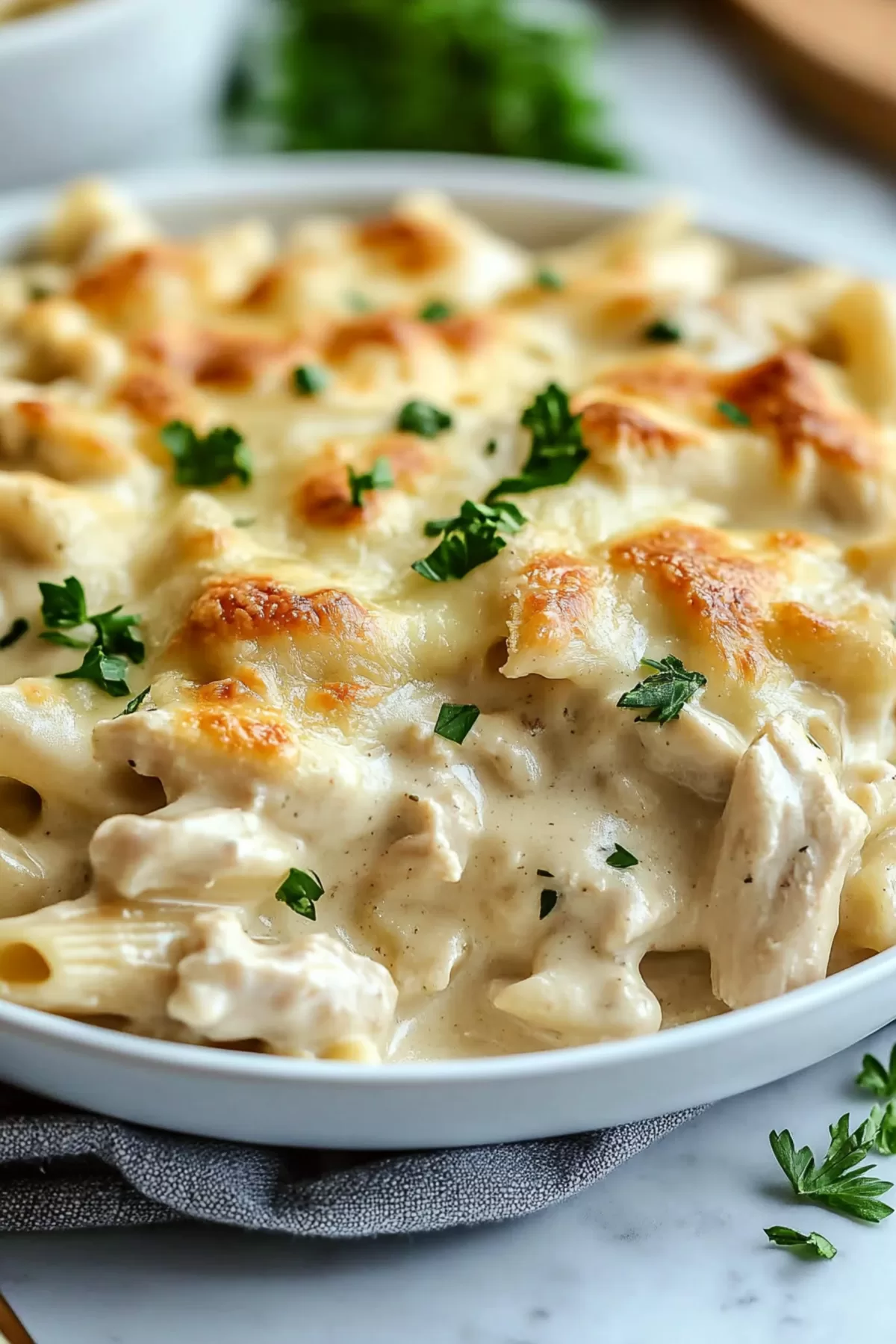 Baked pasta casserole with a creamy, golden crust, ready to serve.