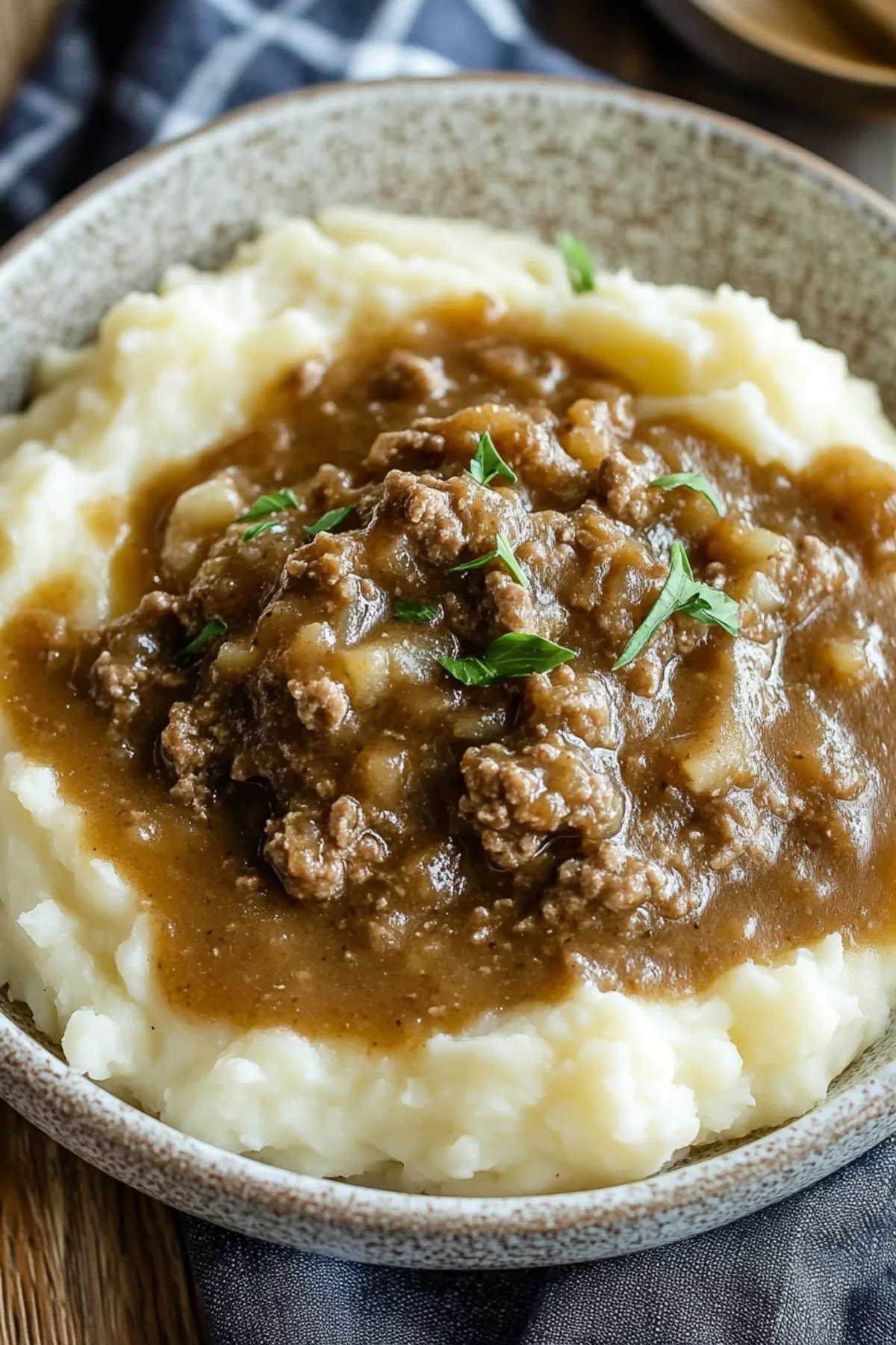 Comforting dish of fluffy potatoes smothered with a flavorful beef and gravy mix.