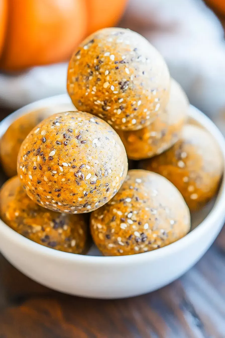 Pumpkin spice snack bites topped with a light dusting of cinnamon.