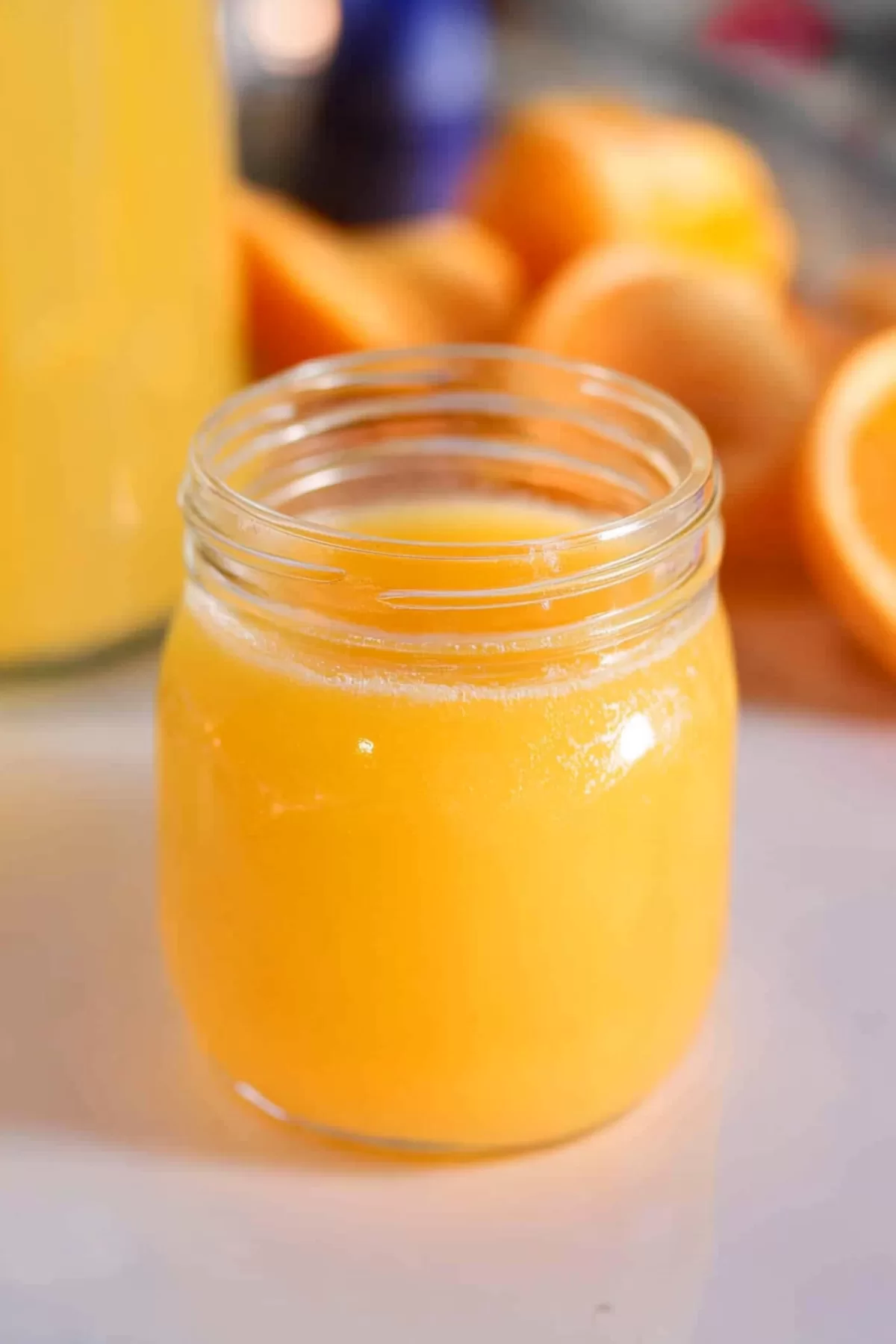 Close-up of a chilled, creamy orange drink with a smooth and velvety texture.