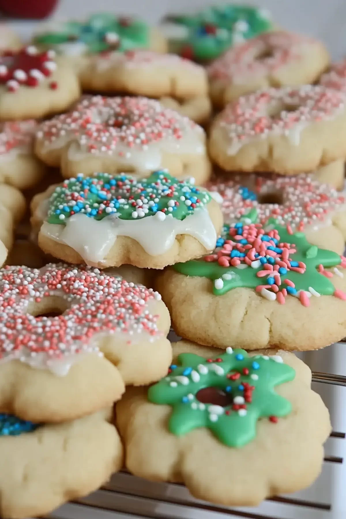 Close-up of beautifully frosted cookies, highlighting their intricate textures and festive colors