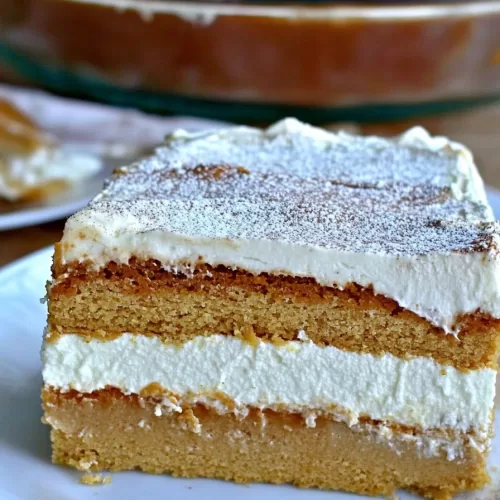 Side view of a pumpkin torte, highlighting its smooth frosting and fluffy layers of spiced pumpkin.