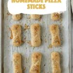 Baked pizza sticks on a sheet pan with text overlay reading the best and easy homemade pizza sticks