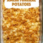 Easy cheesy potato casserole with crispy cornflake topping in a glass baking dish