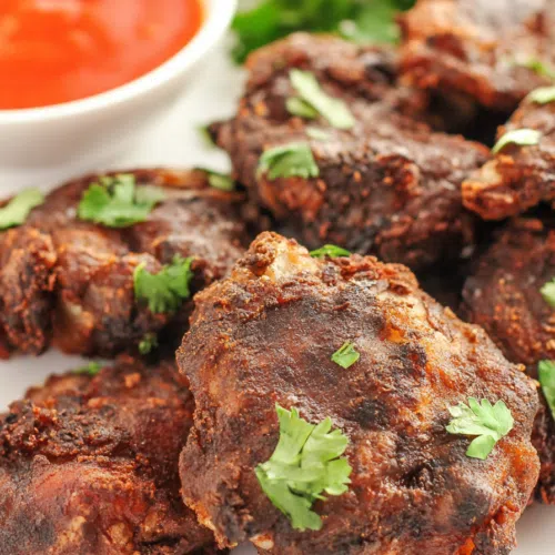 Golden, crunchy bites served with a dipping sauce.