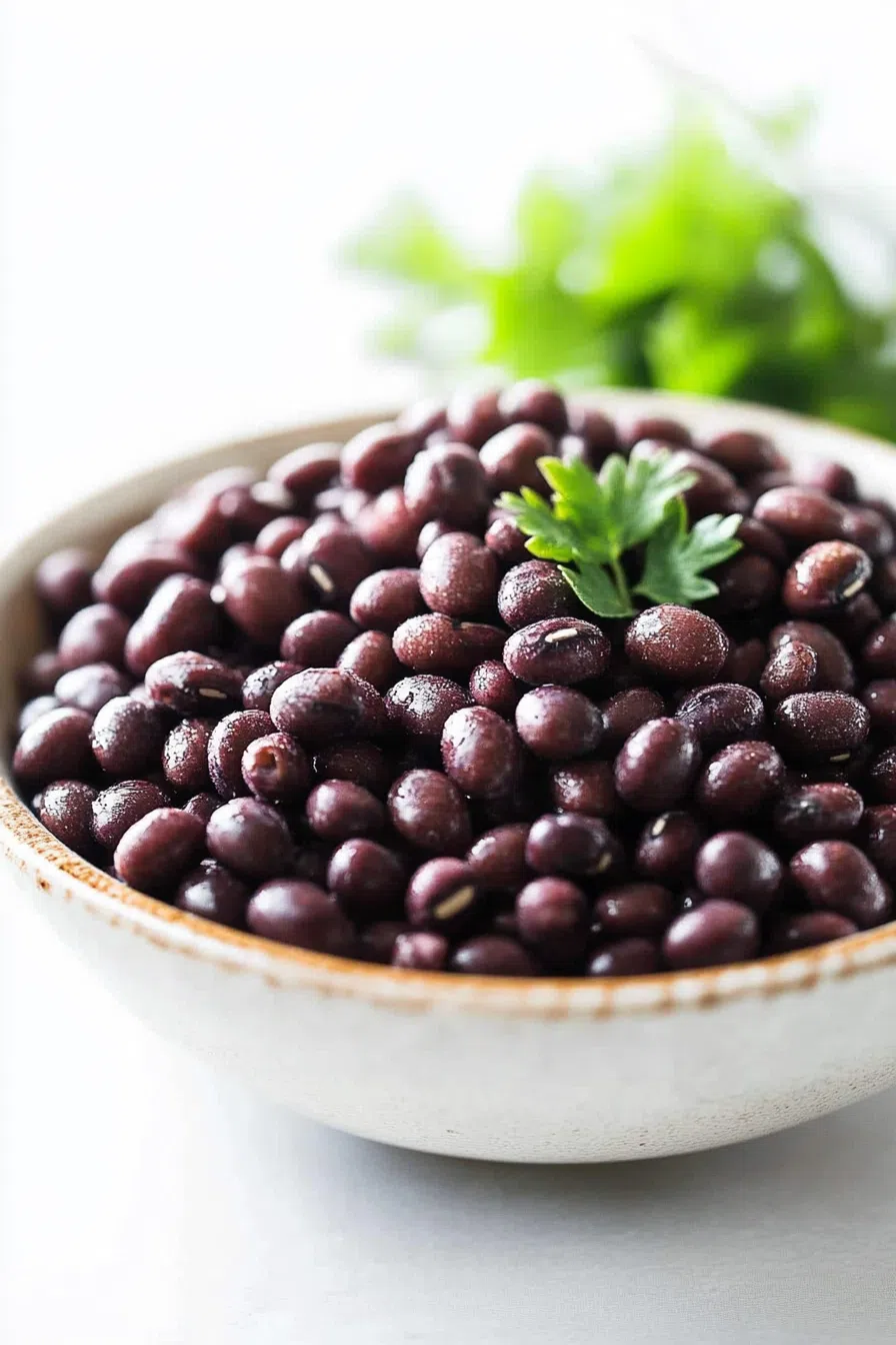 Slow-cooked beans in a flavorful sauce, ready to serve.