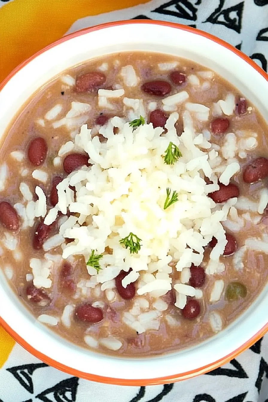 A hearty bowl of creamy beans served over fluffy rice.