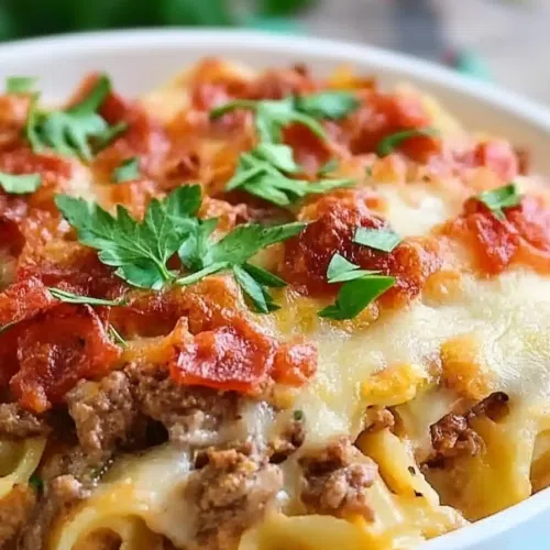 A close-up of the crispy, bubbly cheese topping.