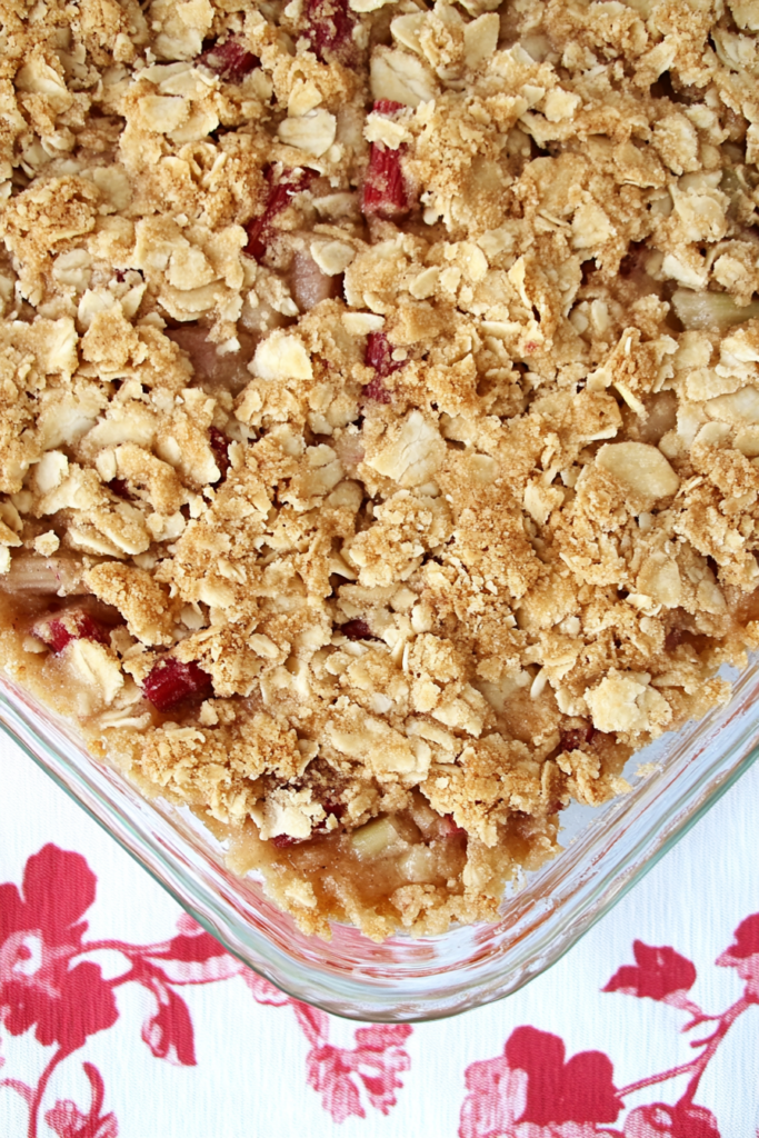 A baking dish of freshly baked crisp with a crispy, golden oat topping.