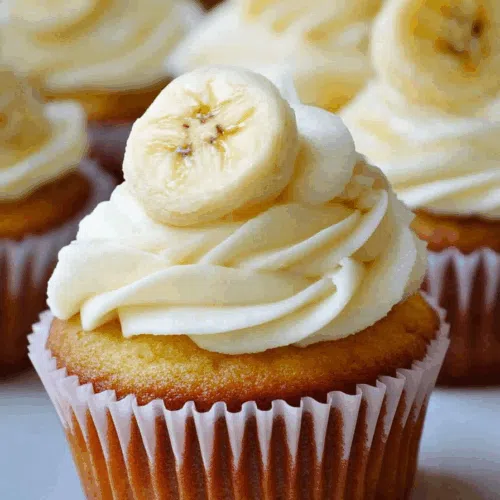Close-up of the swirl pattern in the frosting, accented with a few chocolate pieces.