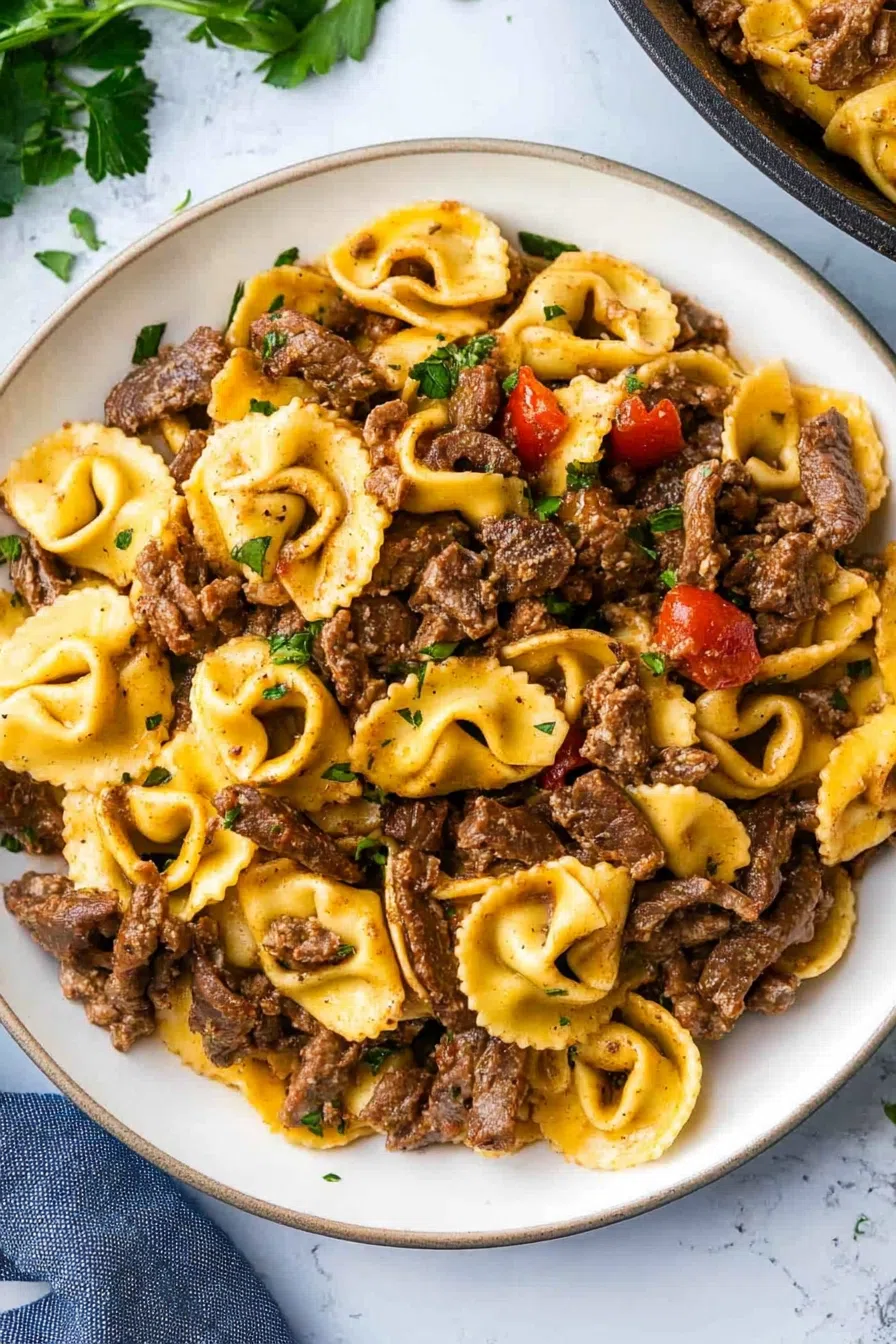 Overhead view of a hearty meal garnished with chopped parsley and crispy edges.