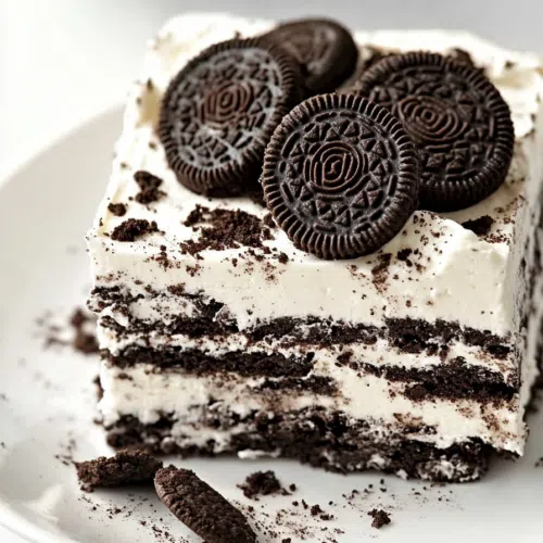 Close-up of a creamy, chocolatey no-bake treat served on a cake stand.