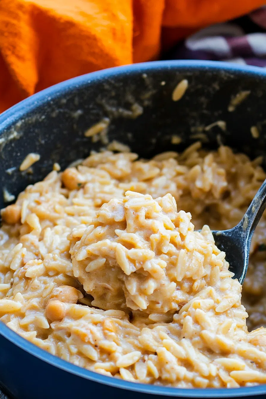 Creamy one-pan dish garnished with fresh parsley and lemon zest.