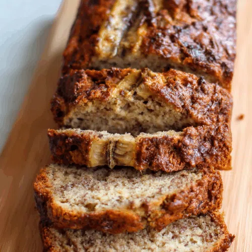 Close-up showing moist interior with bits of mashed fruit throughout.