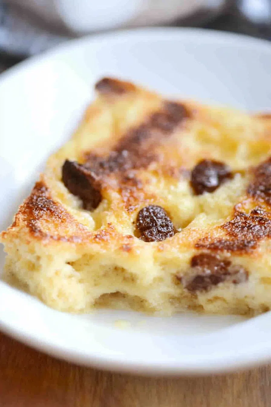 Comforting, oven-baked dish presented in a rustic white bowl with lightly toasted edges.