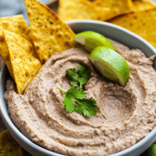 Close-up of thick, blended appetizer with a swirl of seasoning