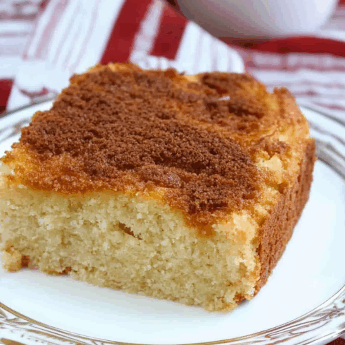 Close-up of a slice revealing a tender crumb and rich, warm spices