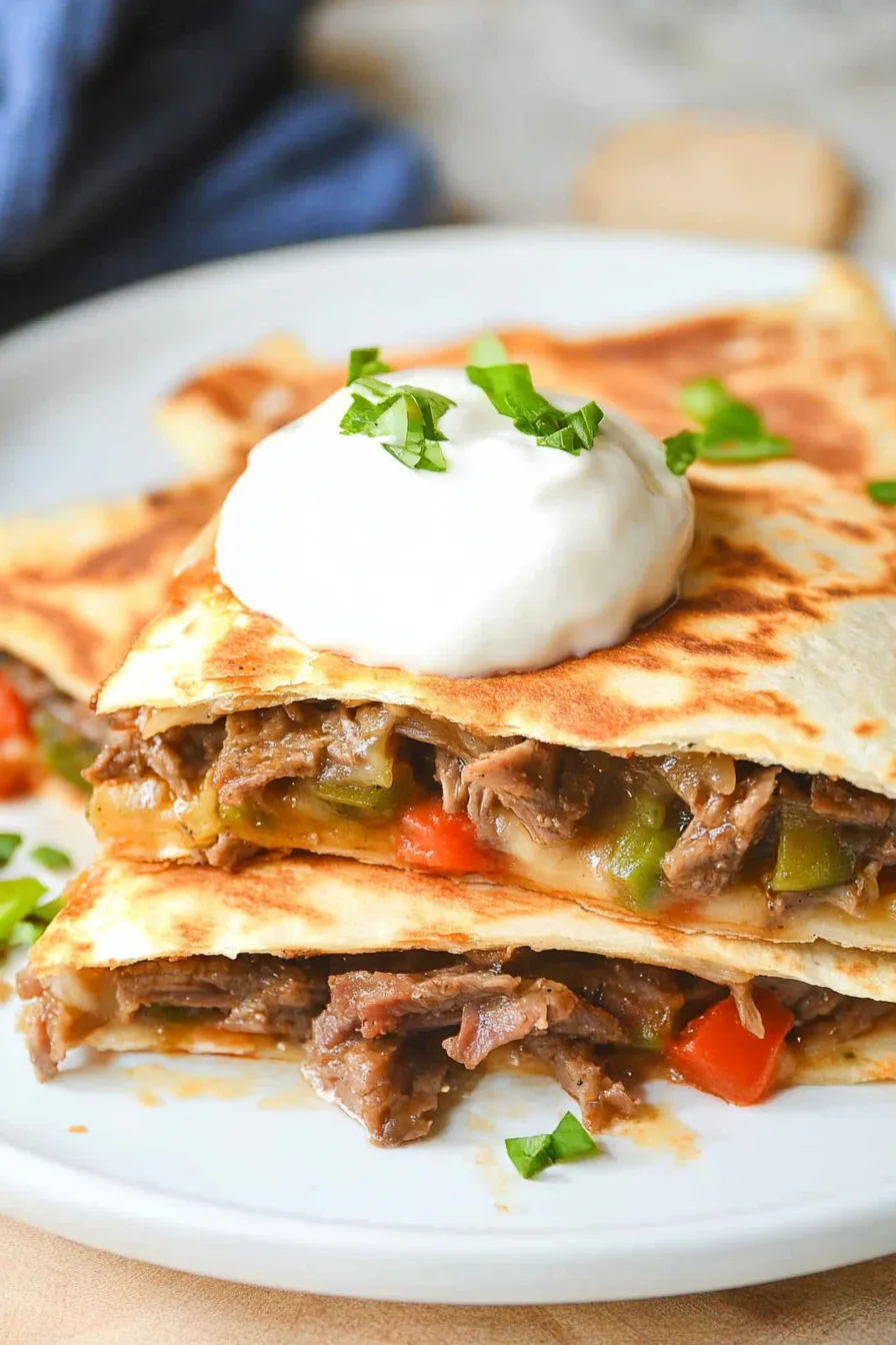 Cheesy quesadilla triangles cut and ready to serve