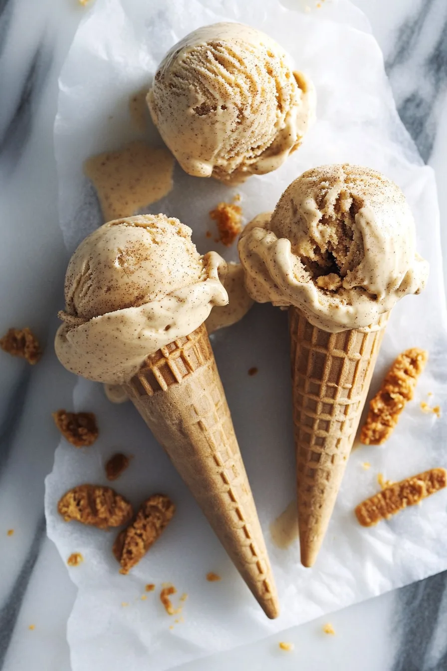 Dessert bowl filled with spiced frozen treat and cookie crumbles