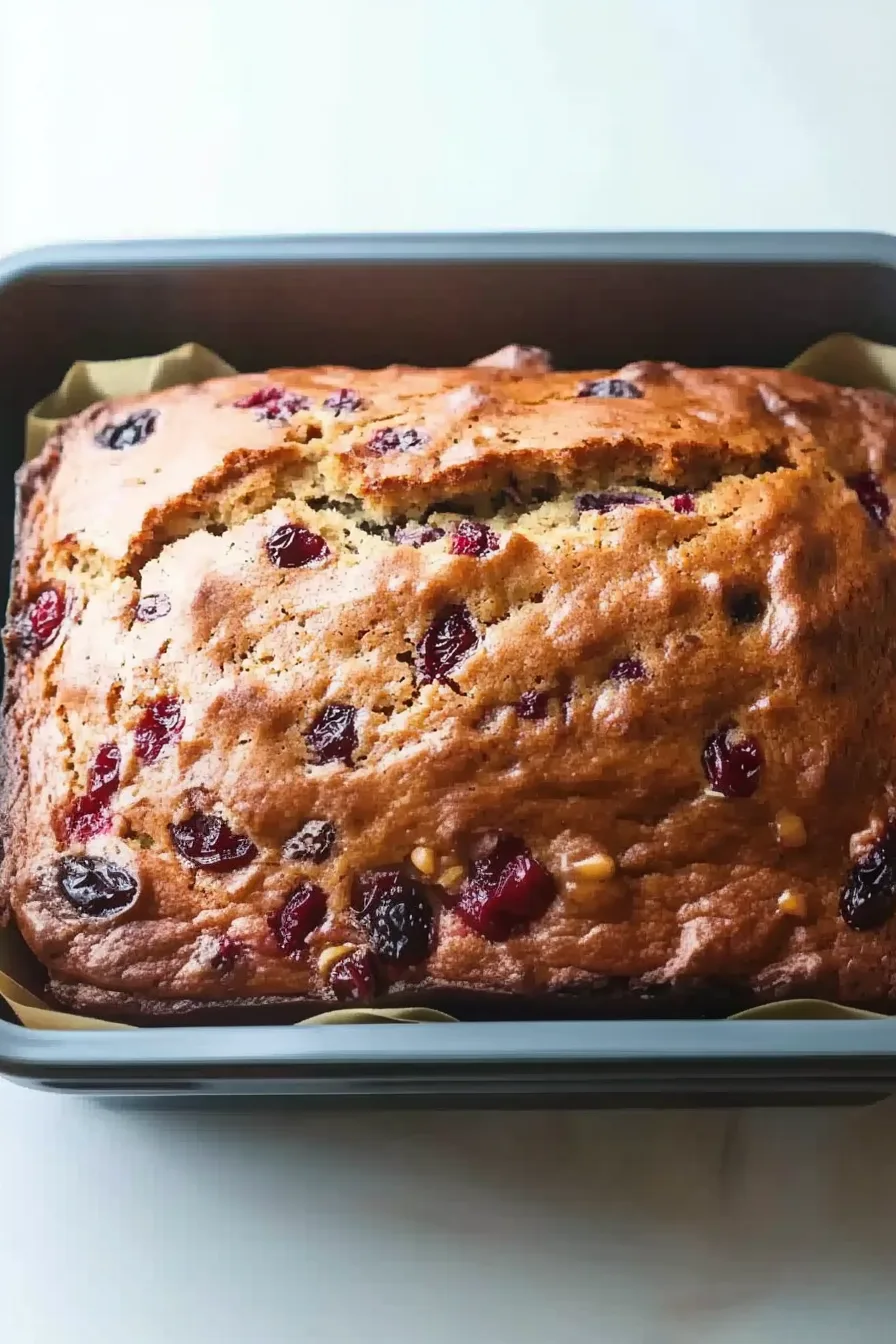 Moist, tender bread with crisp edges and ruby red berries throughout.