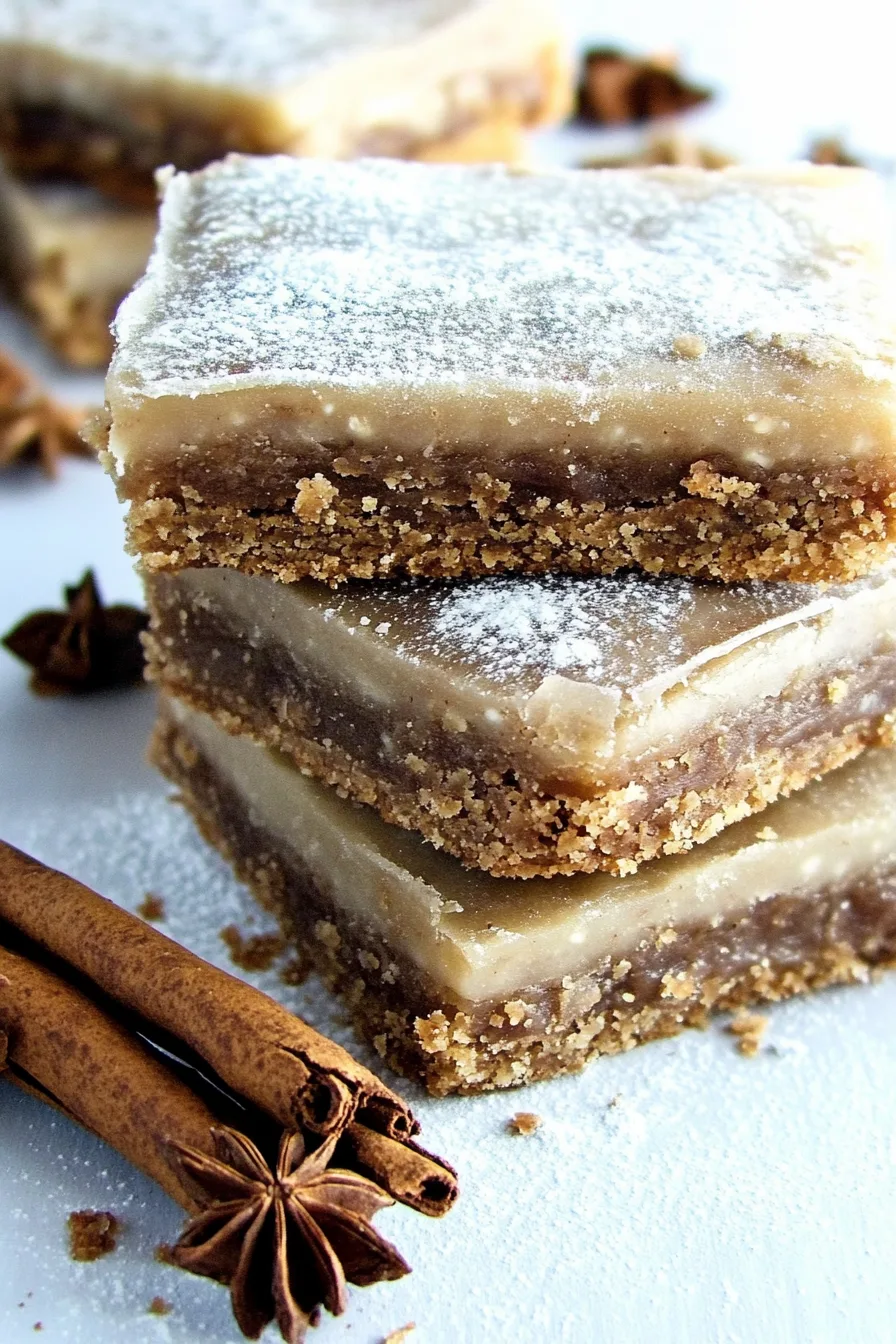 Glazed spice bars arranged on a tray, showing their moist texture.