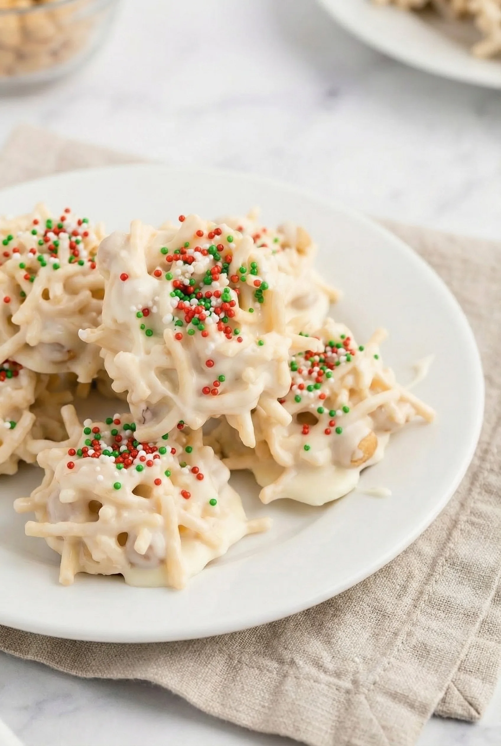 A group of smooth, coated dessert mounds with a crunchy texture.