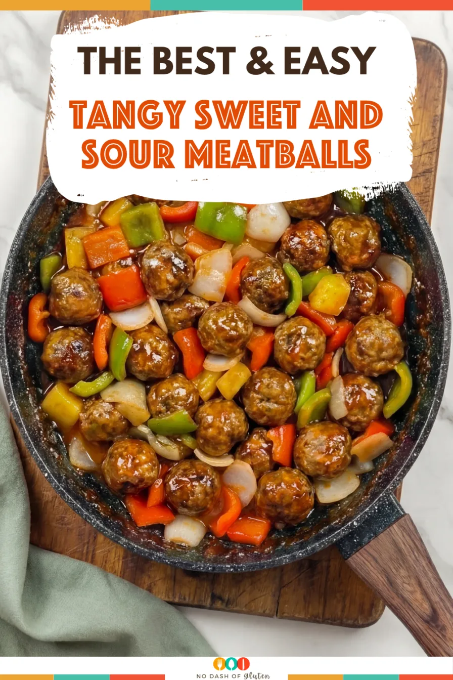 skillet filled with sweet and sour meatballs mixed with bell peppers in rich tangy sauce